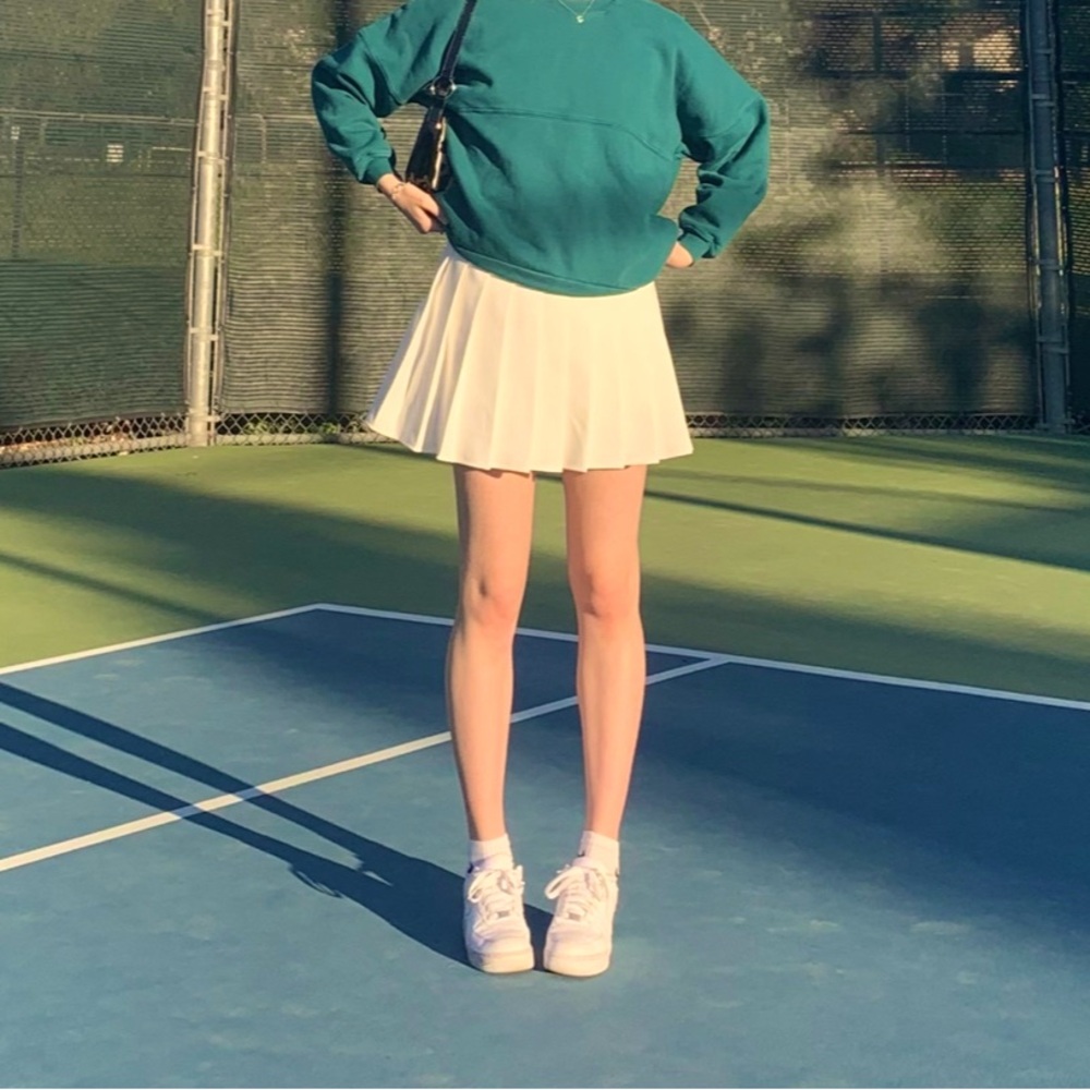 White tennis skirt size large with attached shorts underneath